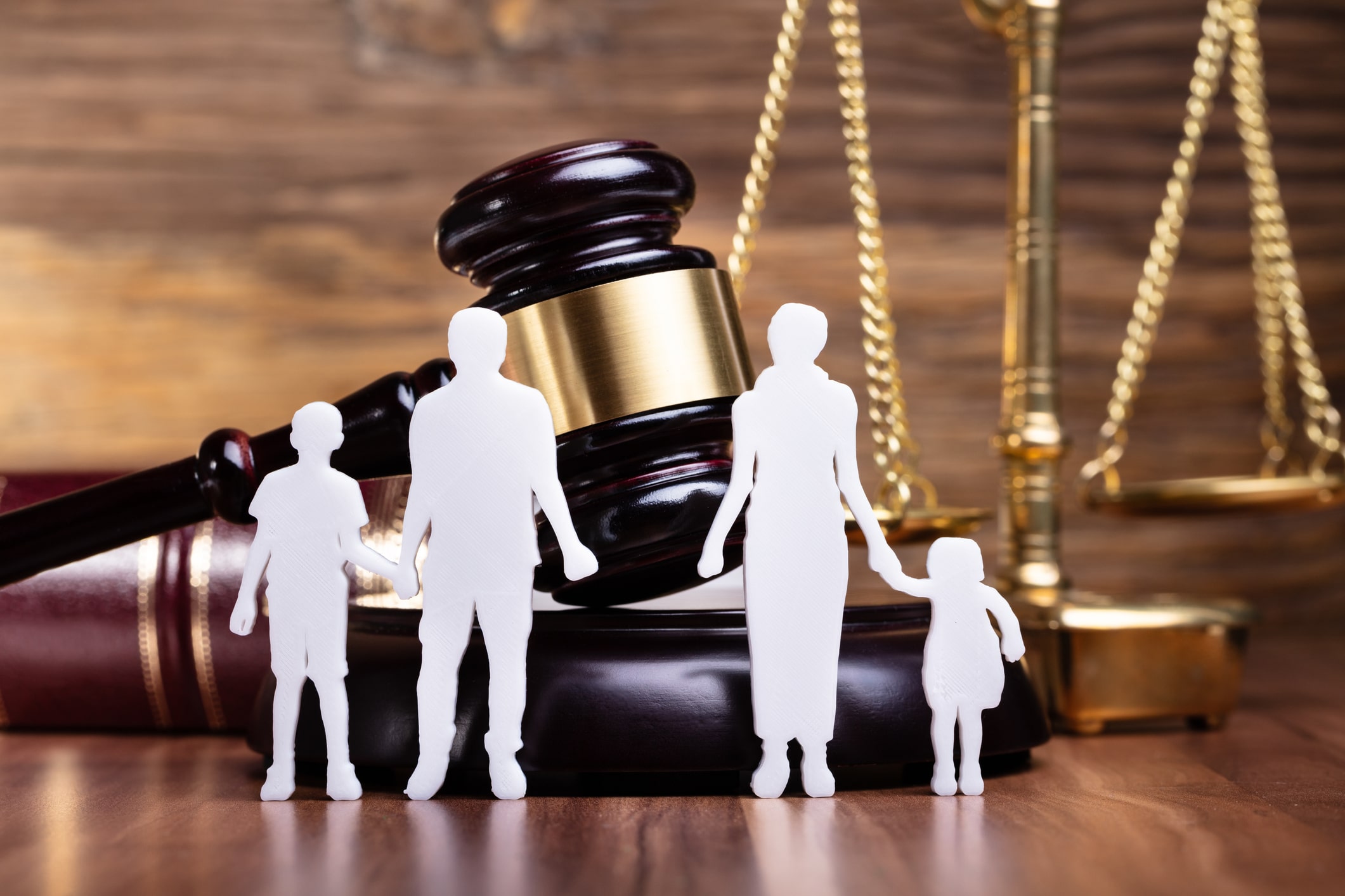 Separation Of Family Figure Cut Out In Front Of Judge Gavel